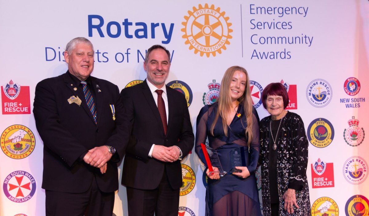 2 men and 2 woman at Rotary event.