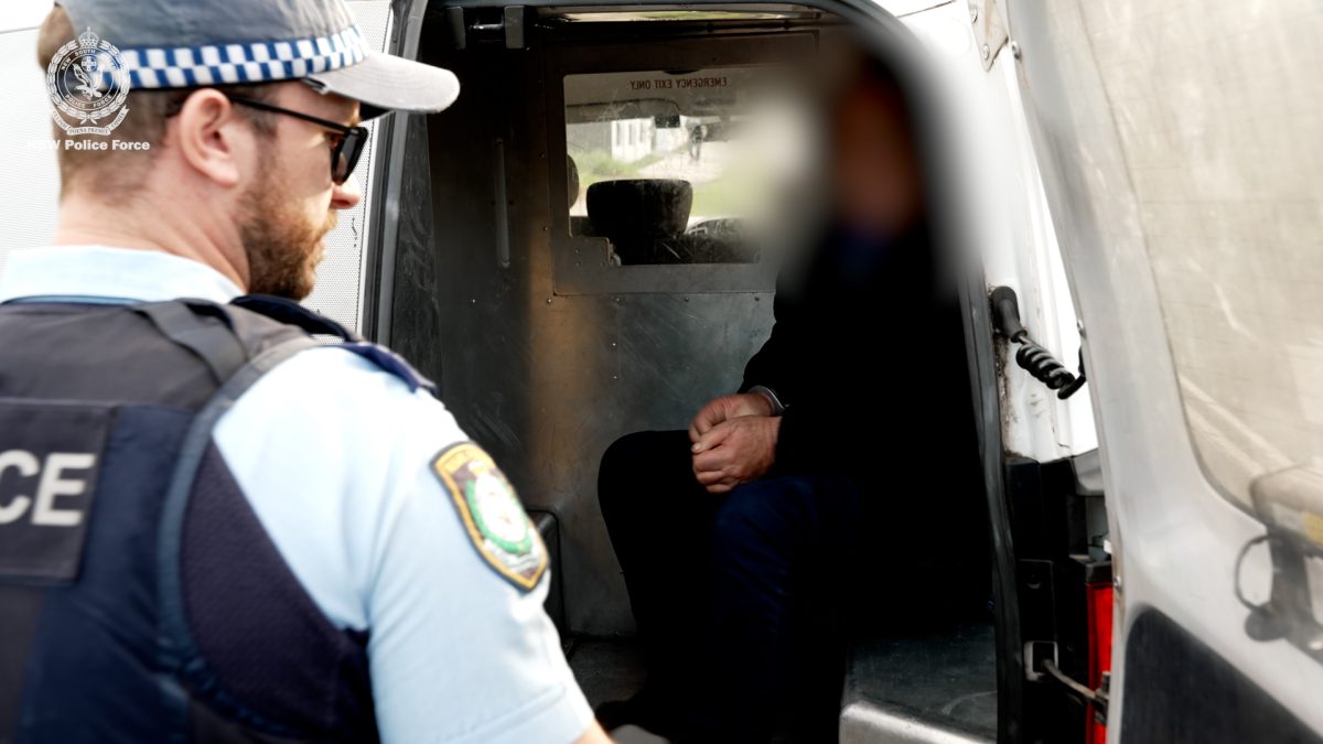 arrested man with police