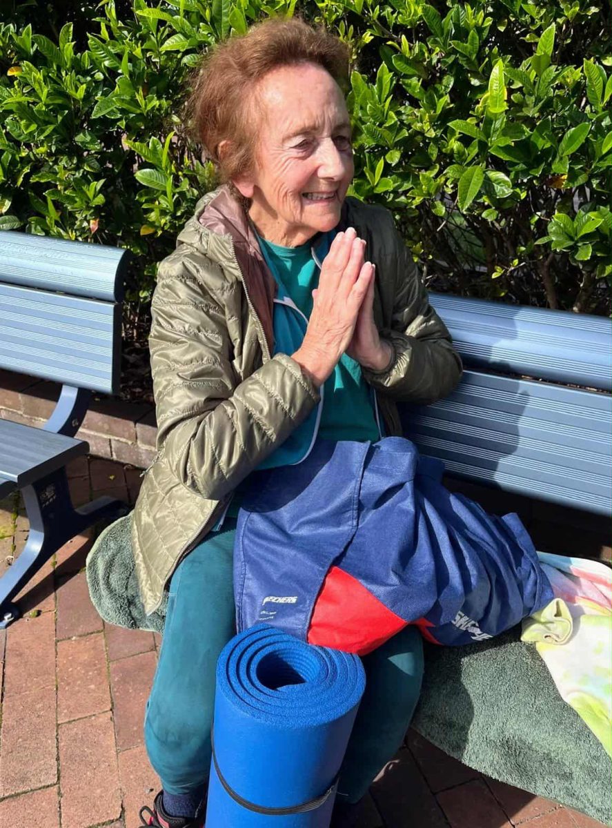 Val Barnsley with her gym bag and yoga mat takes a 'namaste' after one of her early morning yoga classes at Beaton Park Leisure Centre.