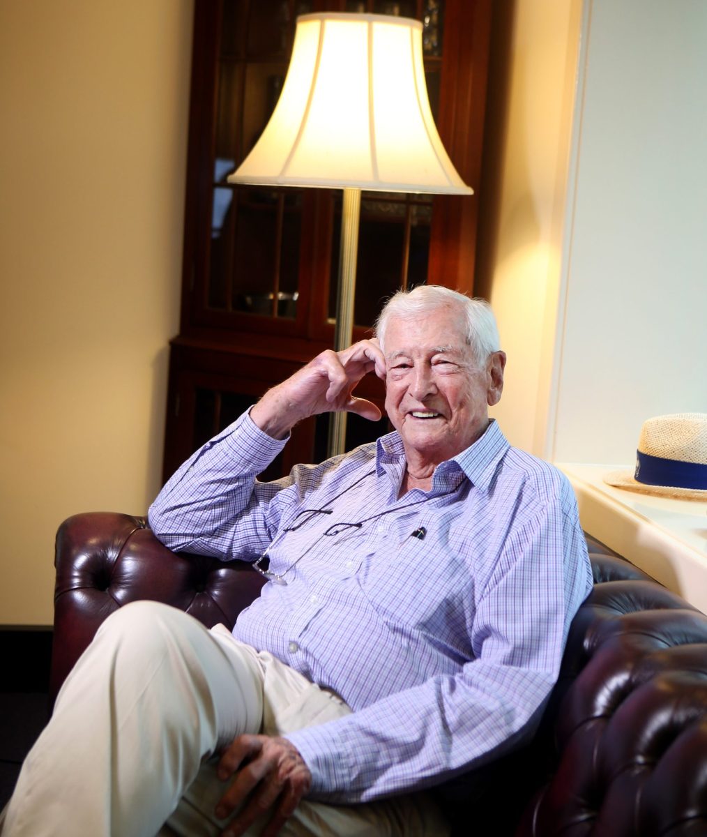 Man sitting under lamp