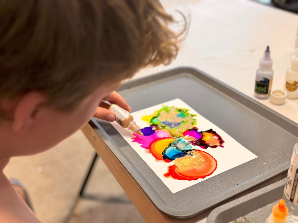 Child experiments with ink art