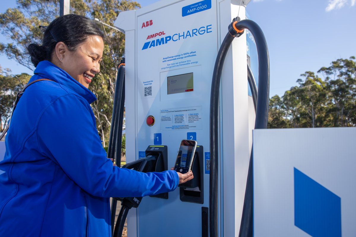 Woman charges EV at Stockland Shellharbour