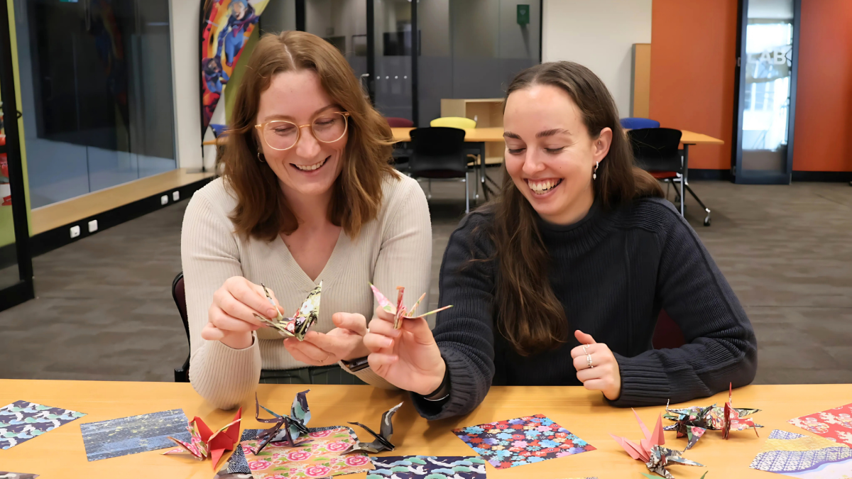 Wollongong City Libraries staff fold origami cranes