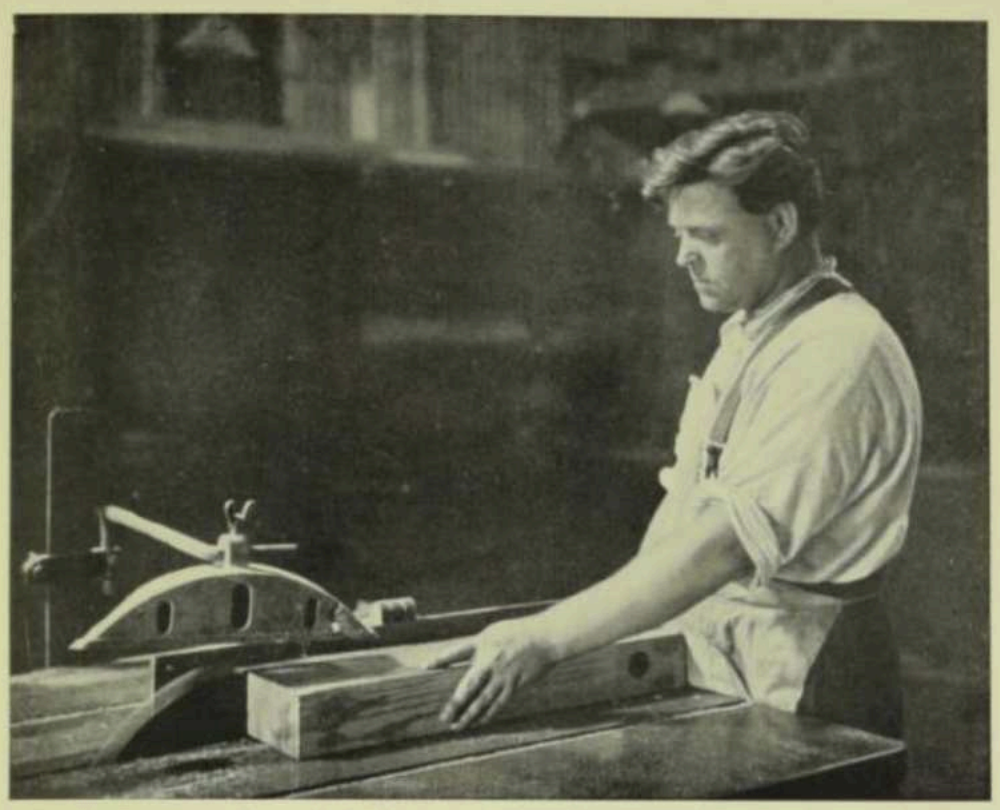 The caption on this George Oyston photo which appeared in the <em>Australian Photographic Review</em> in 1922 says: “The saw bench. Taken about noon in a carpenter’s shop, lit from skylight and side windows. Austral Orthochromatic plate, lens aperture f/7.7 exposure about 6 seconds. Geo. Oyston.”