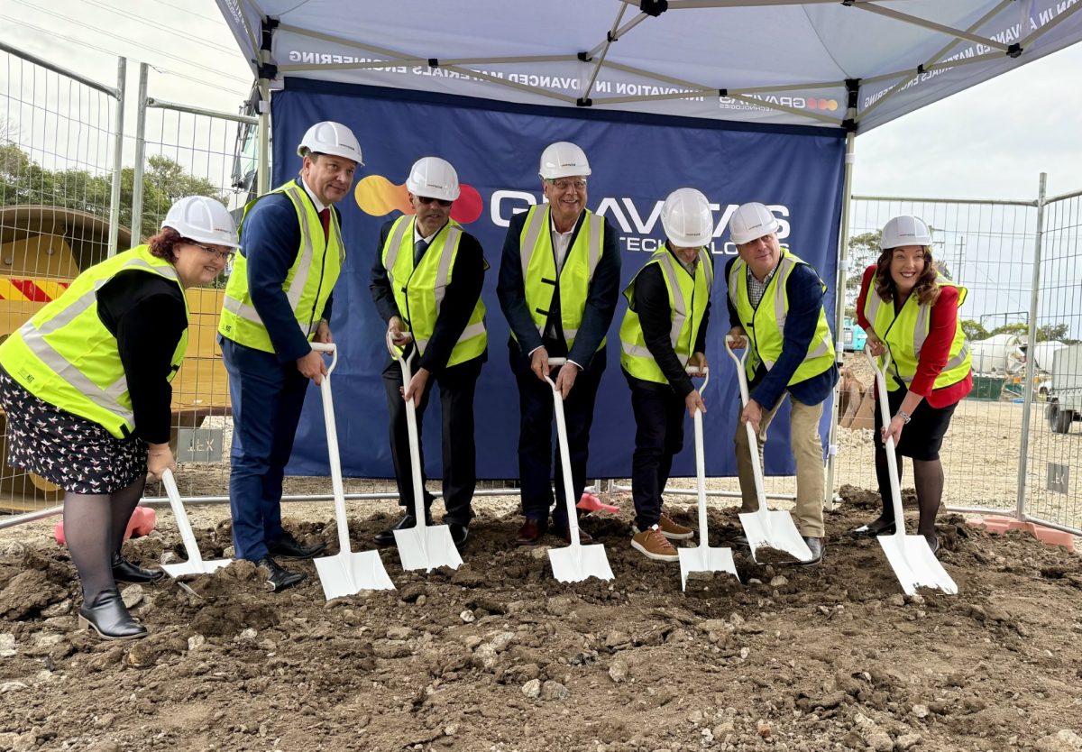 Politicians and Gravitas Technologies representatives breaking ground on construction site.