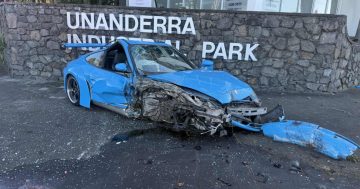 Stolen Porsche smashes into car, pole after pursuit, police allege