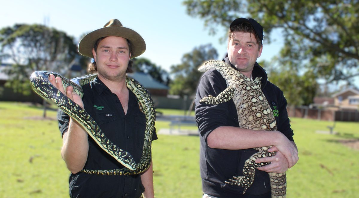 Dragon Training Mobile Zoo keepers Kaylan Bruton-Waite and Rory Shumack.