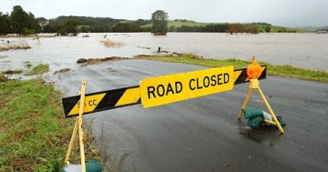 Boom gates to block Swamp Road to manage flood risk