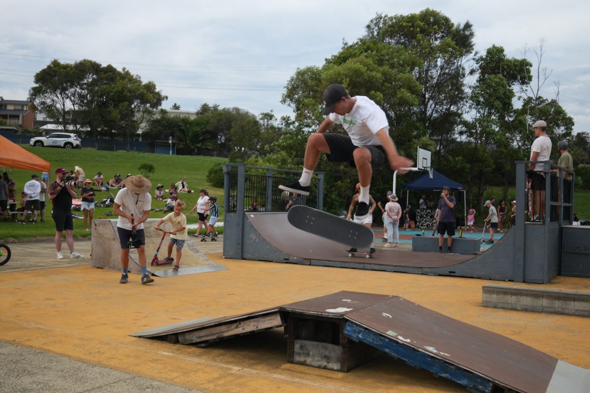 Skateboarder tricks on a DIY skateboard ramp