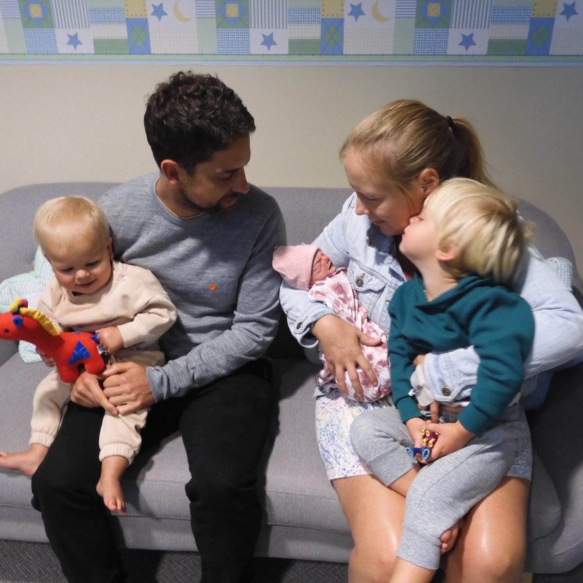 Rachel with her husband, two oldest sons and Rosie. 