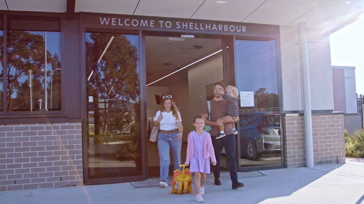 Family walks out of Shellharbour Airport