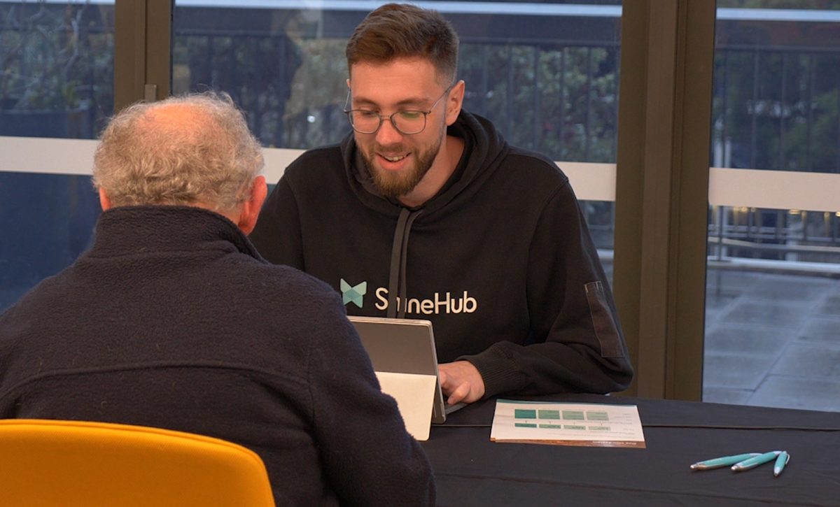 ShineHub experts talks to a resident