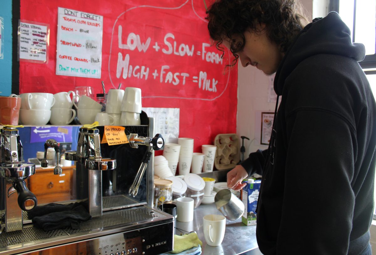 Gabe making coffee at buds and brews