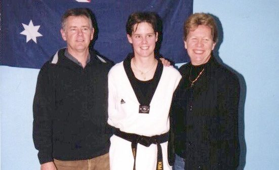 Kim Dalton with her parents.