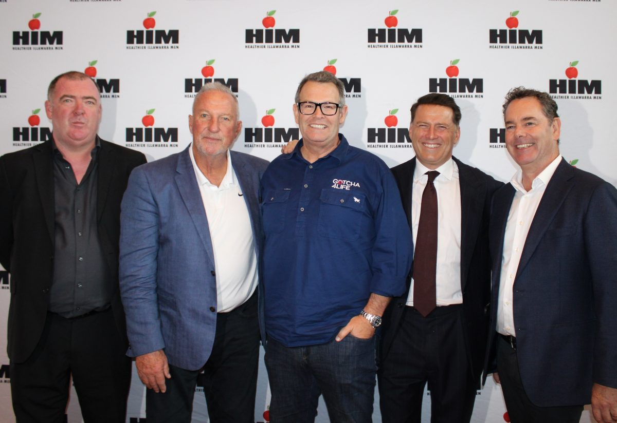 five men standing in a row