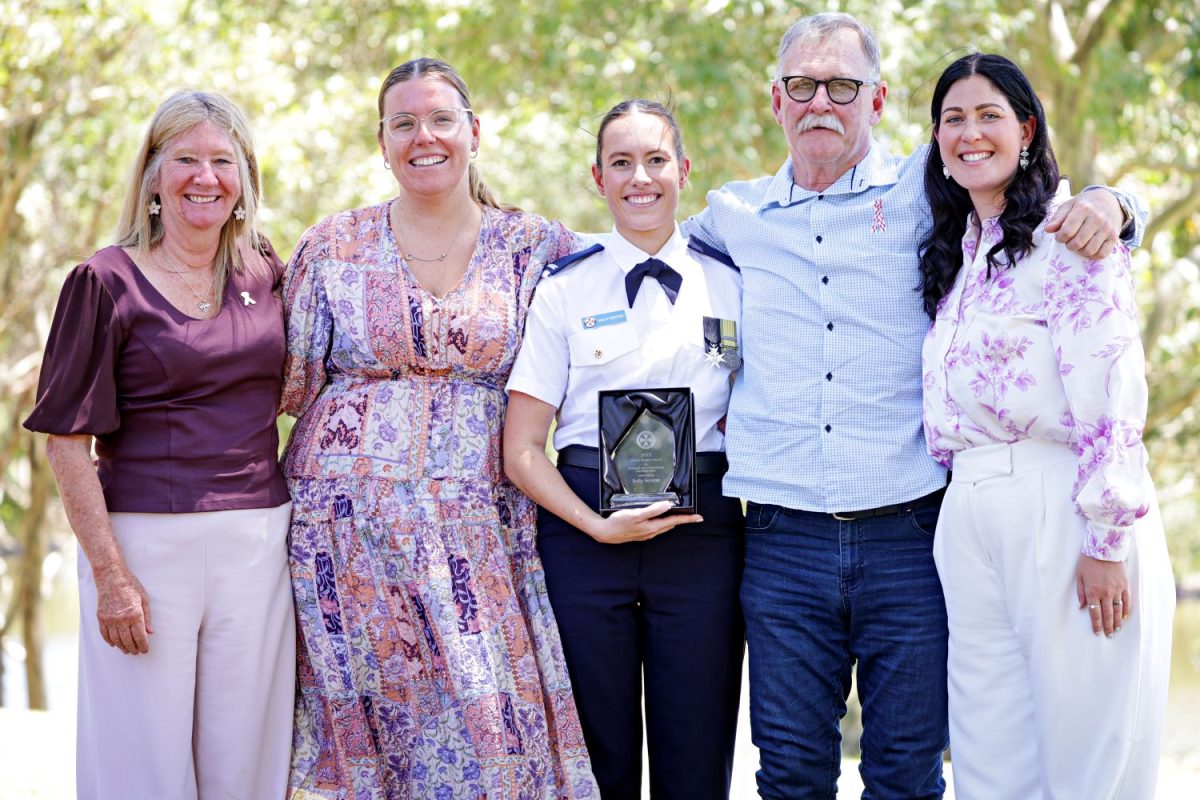 Ambulance officer with four people