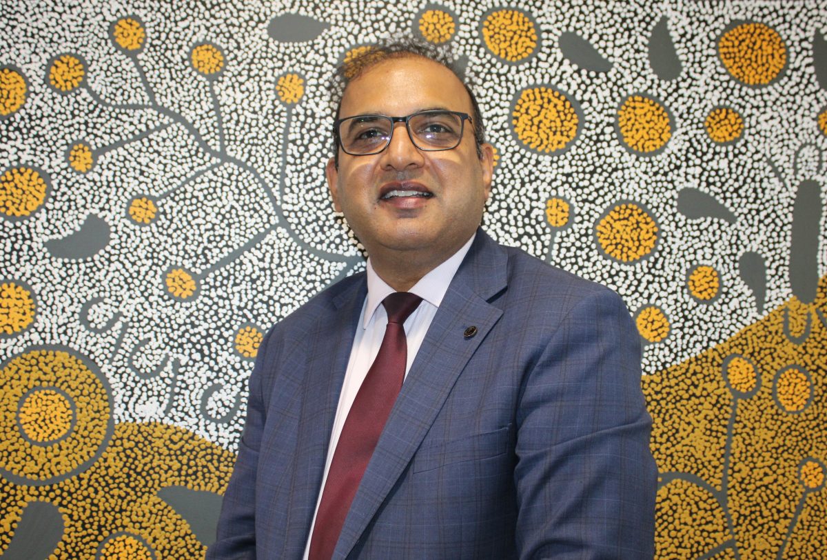 smiling man in a suit