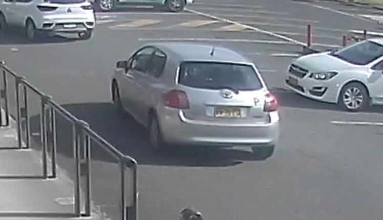 Silver car with P-plate