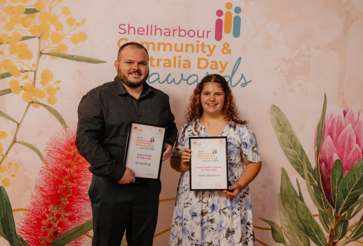 man and woman wth awards