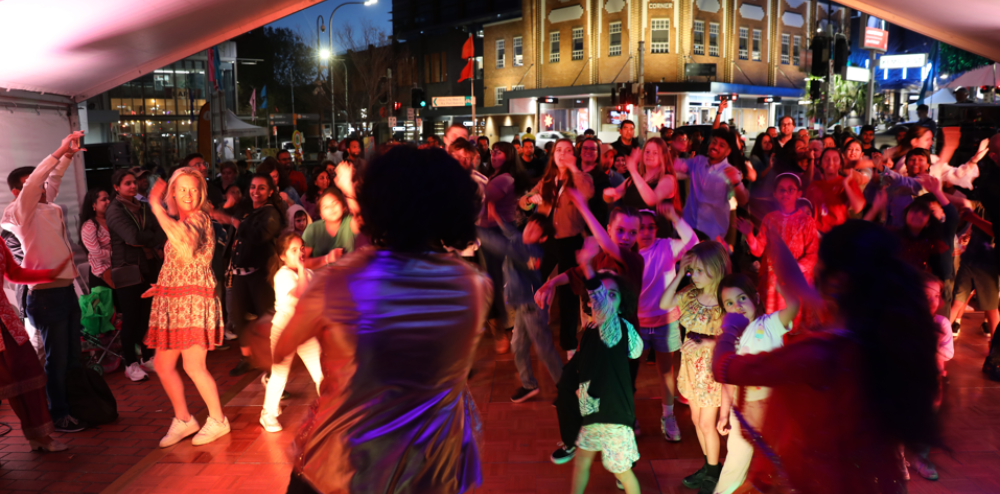 People dance on Wollongong mall