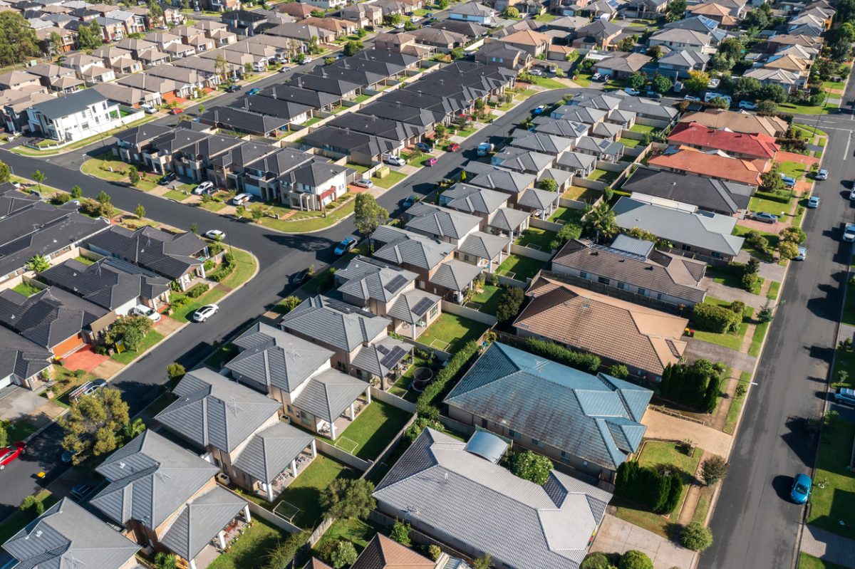 Aerial view of rows of mass produced 'cookie cutter' style homes build during the 2010s in outer suburban Sydney, Australia.